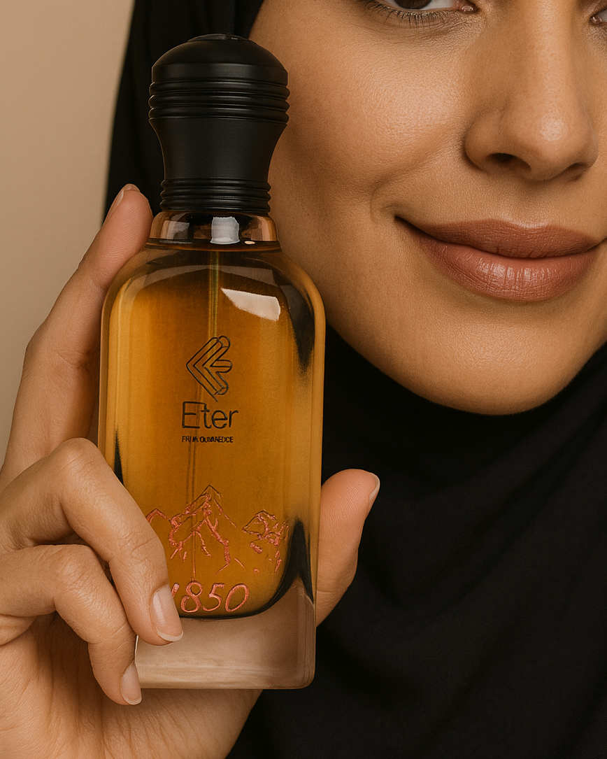 Woman holding a bottle of Eter bottle with a beige background